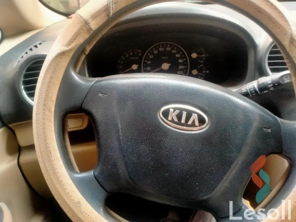 كيا كارينز اوتوماتك مستعملة برونزي موديل 2011 - صورة 4