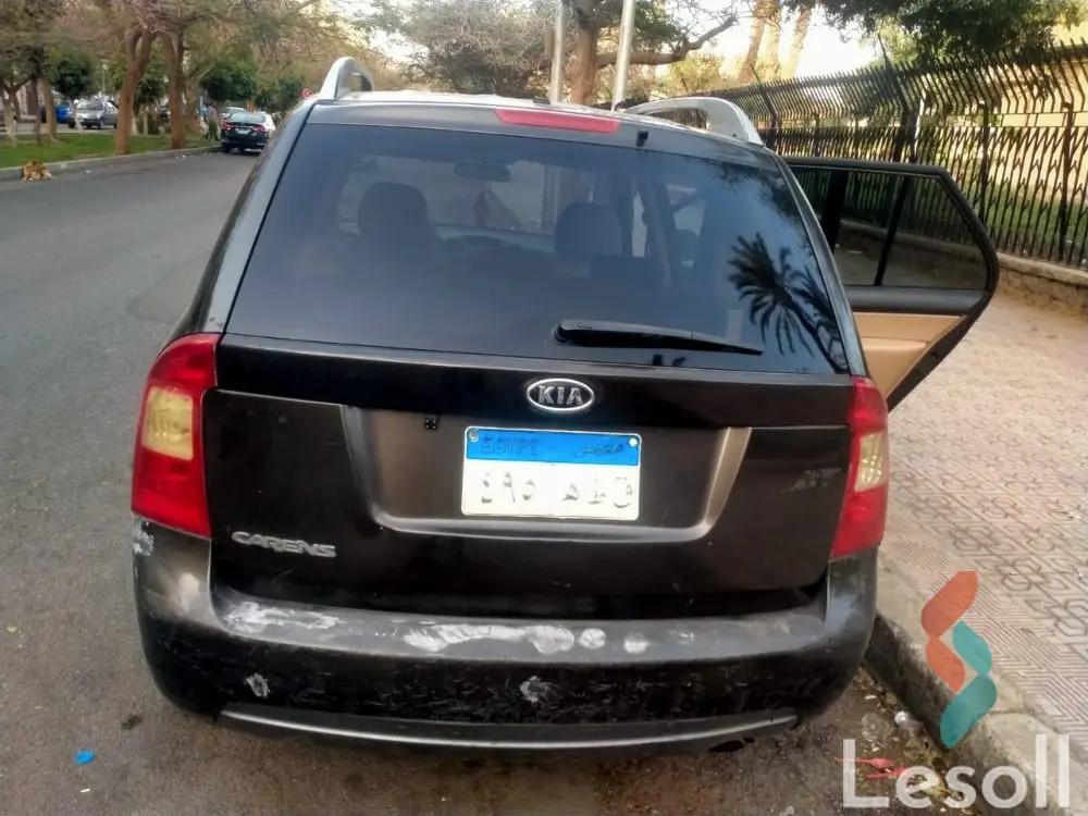 كيا كارينز اوتوماتك مستعملة برونزي موديل 2011 - صورة 3