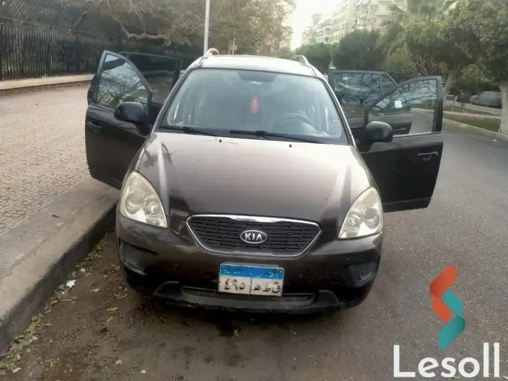 كيا كارينز اوتوماتك مستعملة برونزي موديل 2011 - الصورة الرئيسية