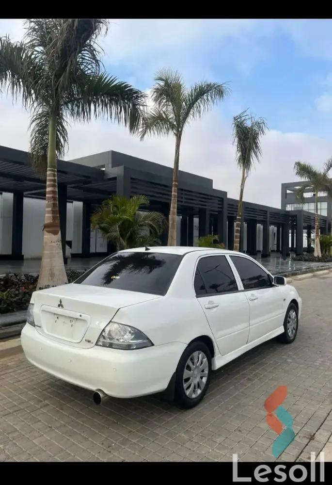 ميتسوبيشي لانسر اوتوماتك مستعملة أبيض موديل 2007