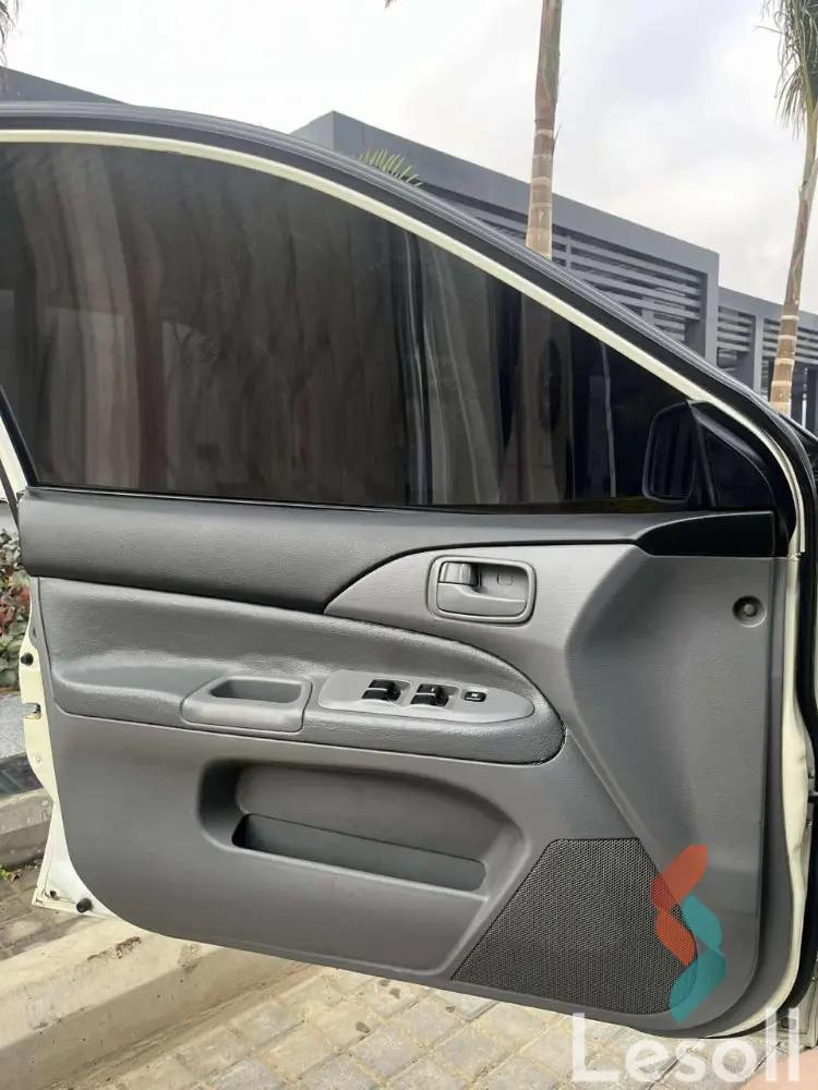 ميتسوبيشي لانسر اوتوماتك مستعملة أبيض موديل 2007