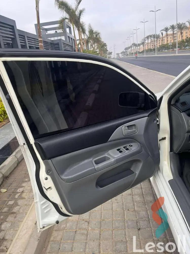 ميتسوبيشي لانسر اوتوماتك مستعملة أبيض موديل 2007