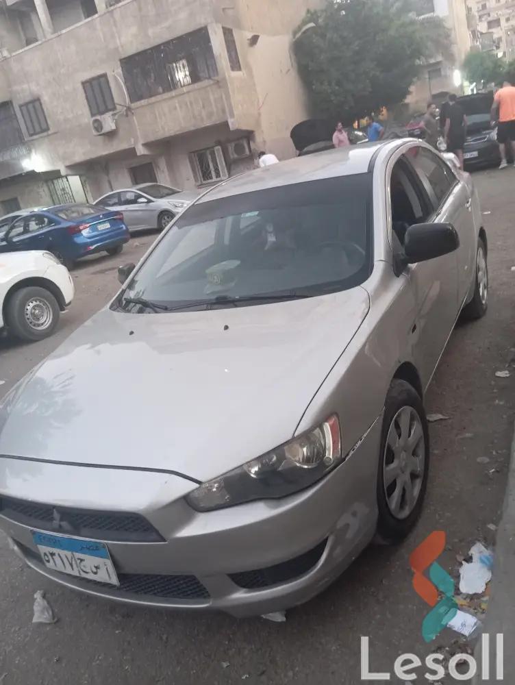 ميتسوبيشي لانسر اوتوماتك مستعملة فضي موديل 2014