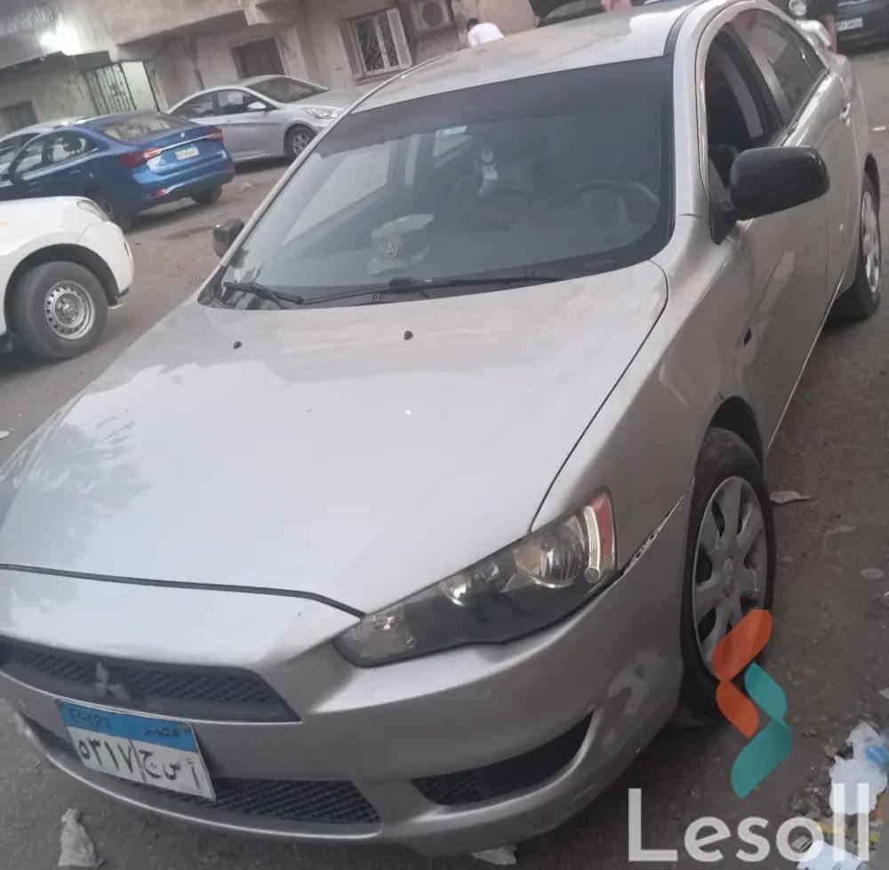 ميتسوبيشي لانسر اوتوماتك مستعملة فضي موديل 2014