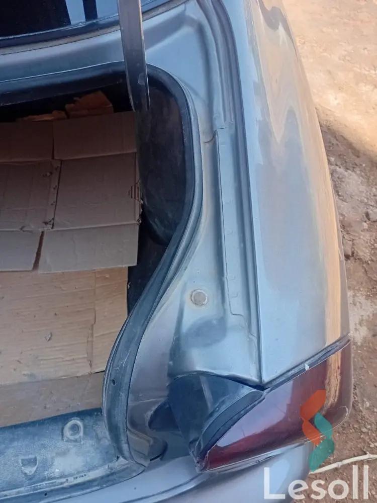 دايو لانوس مانيوال مستعملة رمادي داكن موديل 2015 - كل الصور