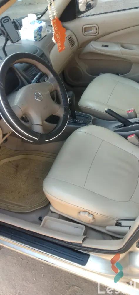 Nissan sunny automatic used gold model 2012 - All Images