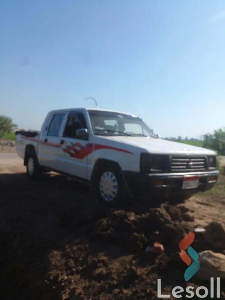 ميتسوبيشي لانسر مانيوال مستعملة أبيض موديل 2003