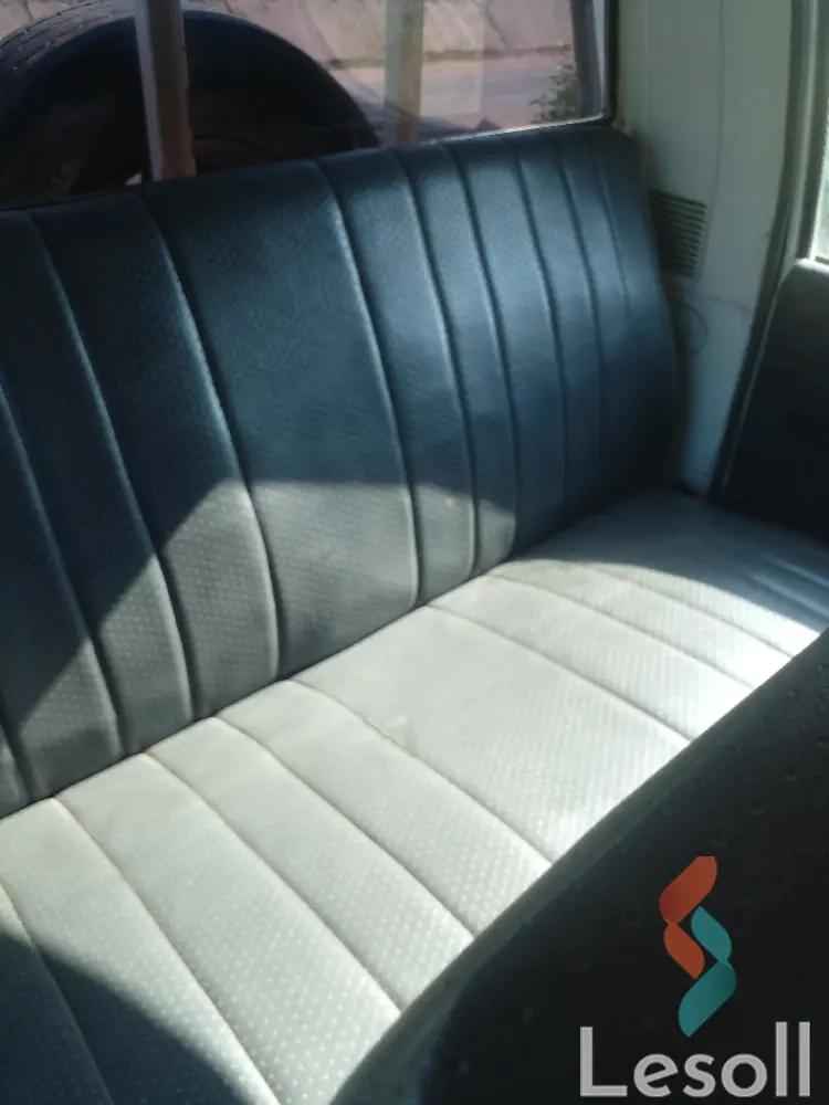 ميتسوبيشي لانسر مانيوال مستعملة أبيض موديل 2003