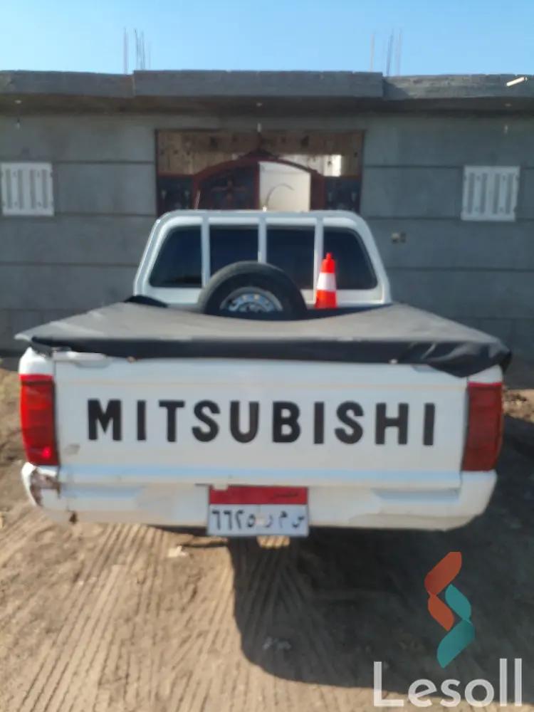 ميتسوبيشي لانسر مانيوال مستعملة أبيض موديل 2003