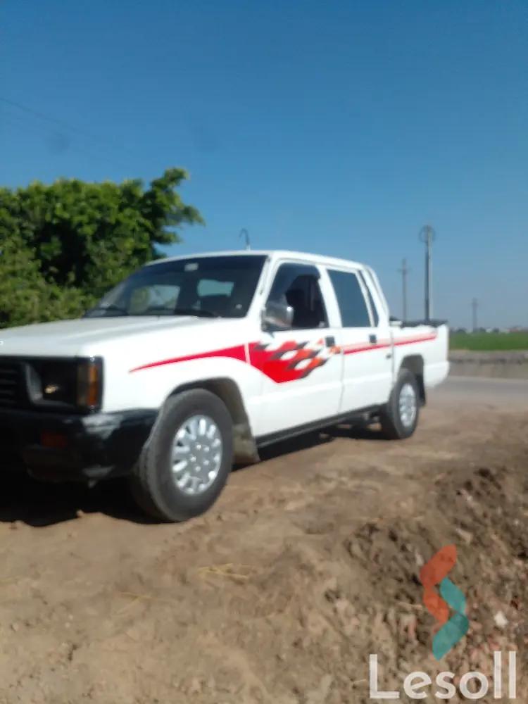 ميتسوبيشي لانسر مانيوال مستعملة أبيض موديل 2003