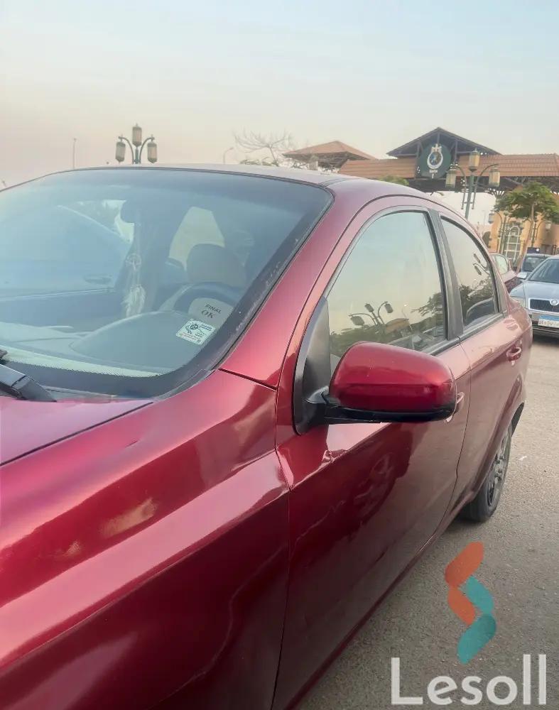 شيفروليه افيو اوتوماتك مستعملة أحمر موديل 2013