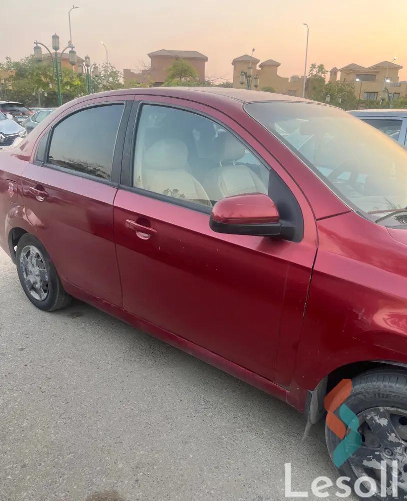 شيفروليه افيو اوتوماتك مستعملة أحمر موديل 2013