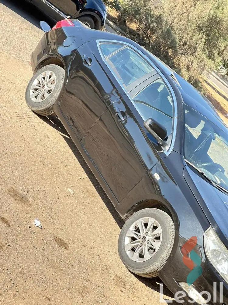 شيفروليه أوبترا اوتوماتك مستعملة أسود موديل 2016