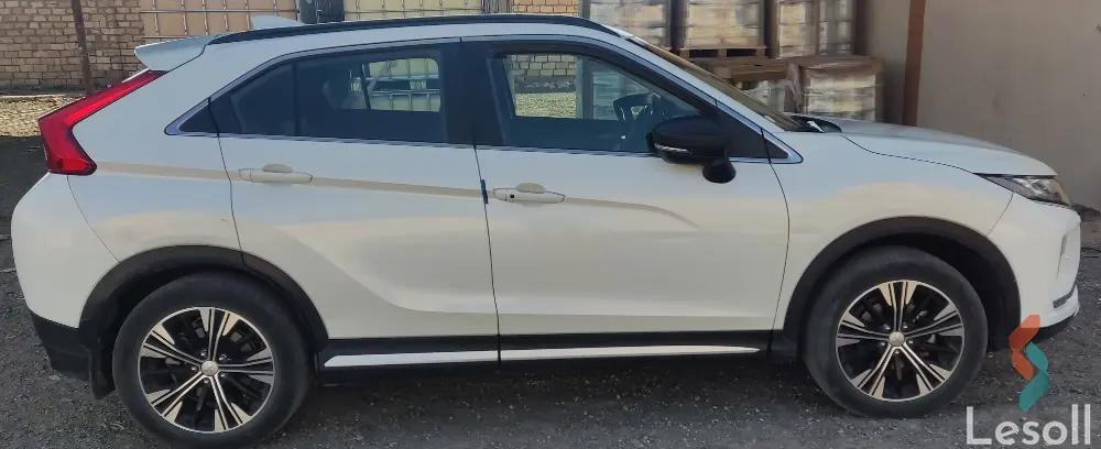 ميتسوبيشي إكليبس كروس اوتوماتك مستعملة أبيض موديل 2021 - كل الصور