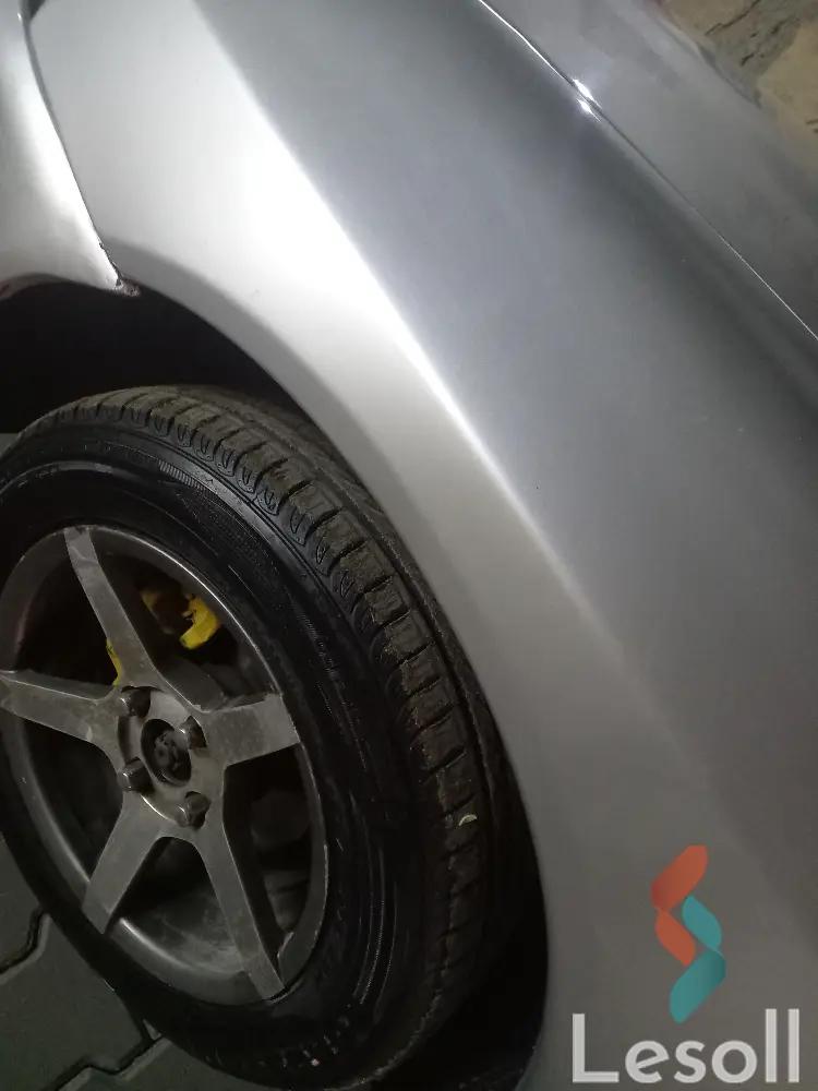 ميتسوبيشي لانسر اوتوماتك مستعملة فضي موديل 1998