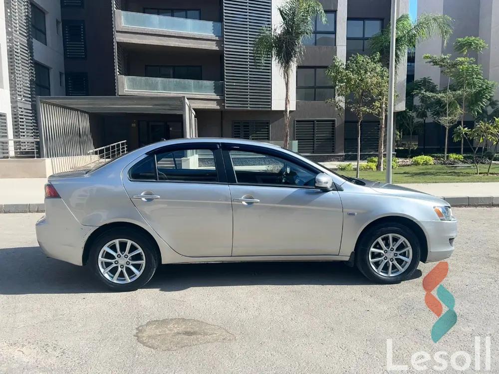 ميتسوبيشي لانسر اوتوماتك مستعملة فضي موديل 2015