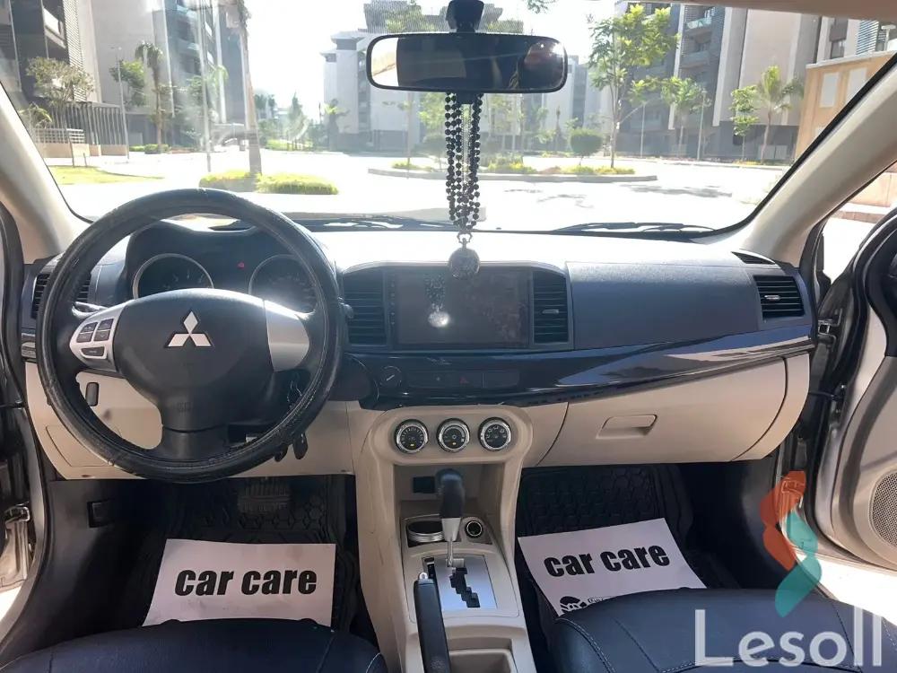 ميتسوبيشي لانسر اوتوماتك مستعملة فضي موديل 2015