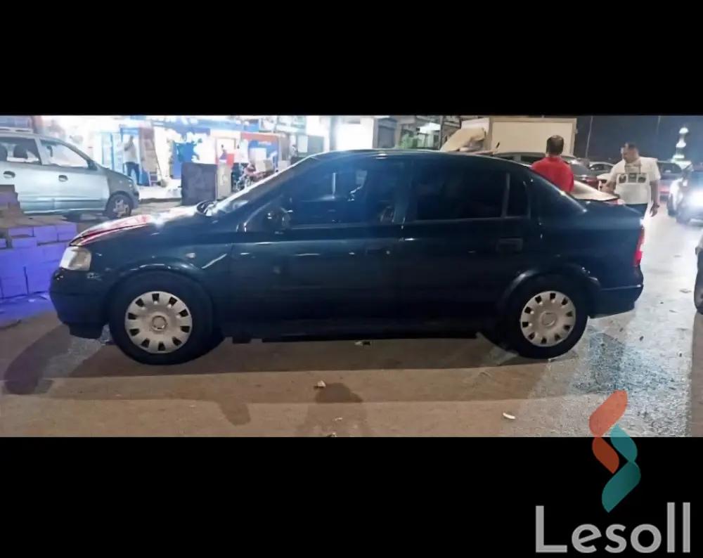 أوبل أسترا مانيوال مستعملة كحلي موديل 2002 - كل الصور