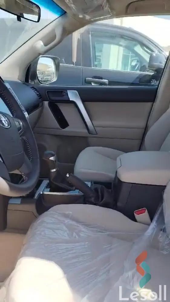 تويوتا لاندكروزربرادو اوتوماتك جديدة أبيض موديل 2023