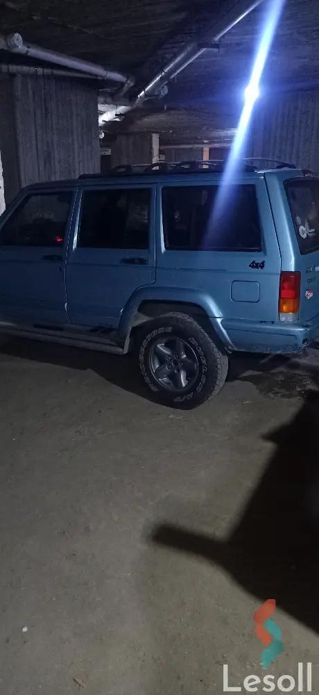 جيب شيروكي اوتوماتك مستعملة أزرق سماوي موديل 2002