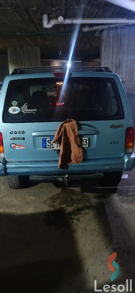 جيب شيروكي اوتوماتك مستعملة أزرق سماوي موديل 2002 - كل الصور