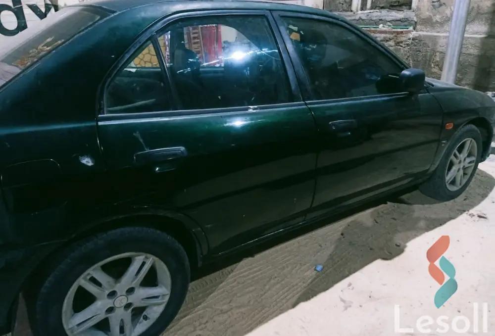 ميتسوبيشي ميراج اوتوماتك مستعملة أخضر موديل 1999