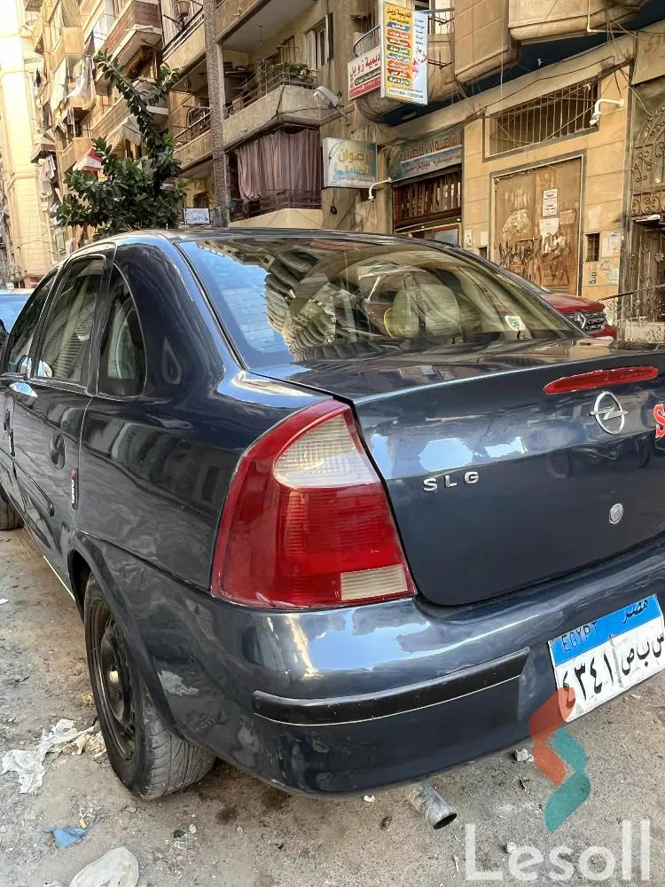 أوبل كورسا مانيوال مستعملة كحلي موديل 2004 - كل الصور