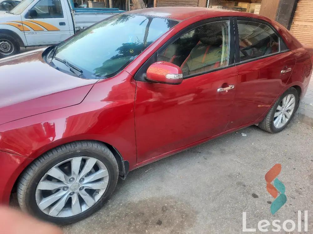 كيا سيراتو اوتوماتك جديدة أحمر موديل 2010