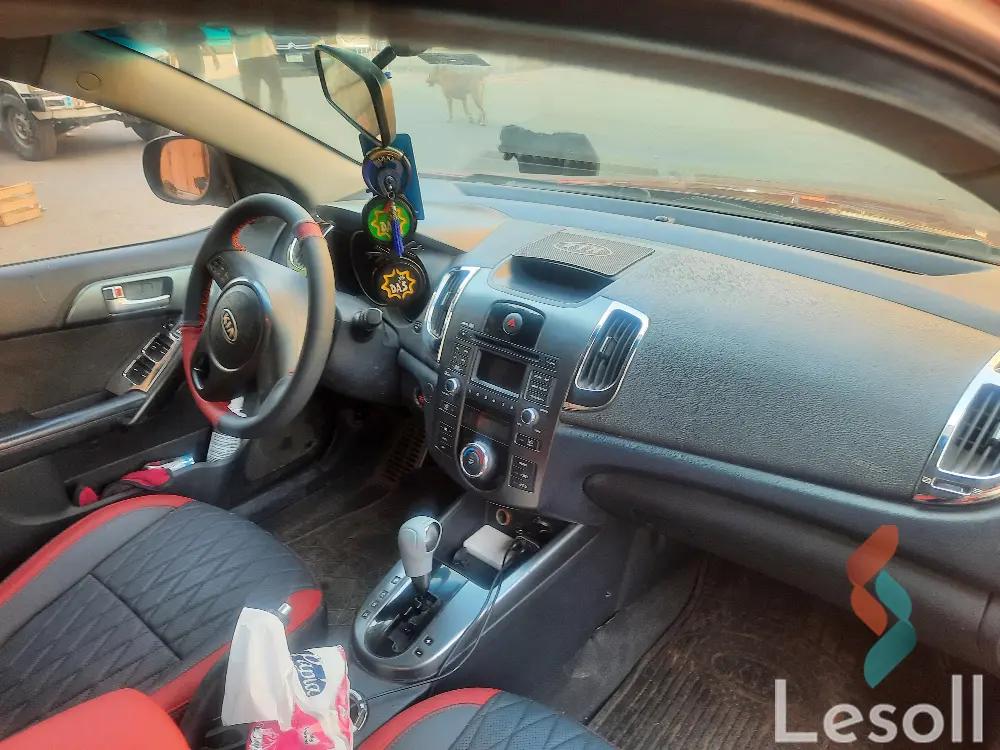 كيا سيراتو اوتوماتك جديدة أحمر موديل 2010 - كل الصور