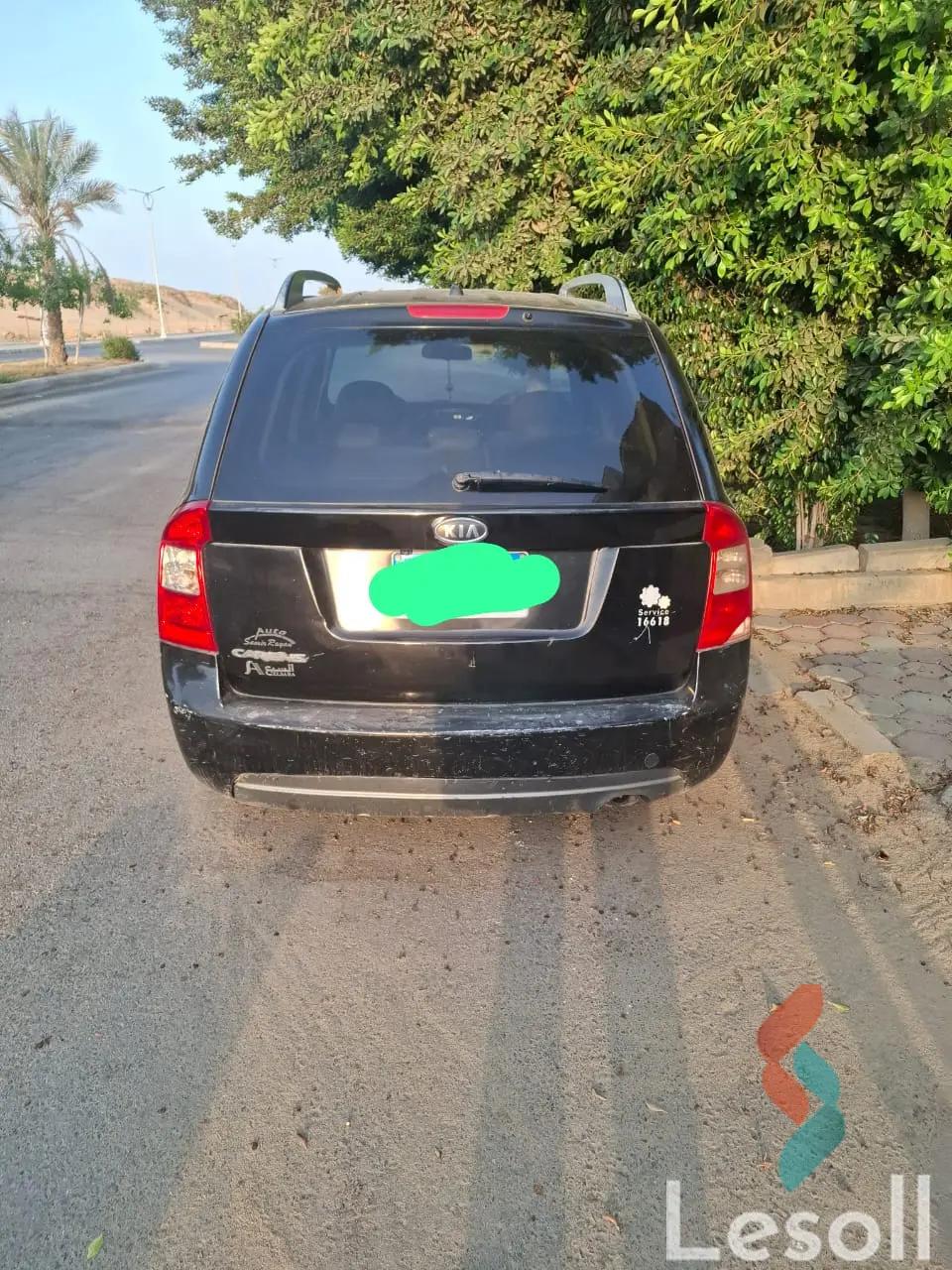 كيا كارينز اوتوماتك مستعملة أسود موديل 2011