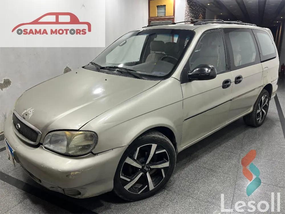 كيا كارنفال اوتوماتك مستعملة ذهبي موديل 1999