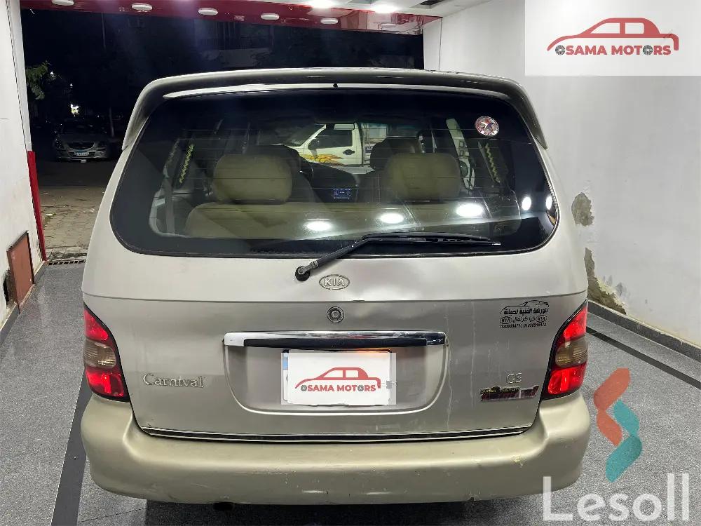 كيا كارنفال اوتوماتك مستعملة ذهبي موديل 1999