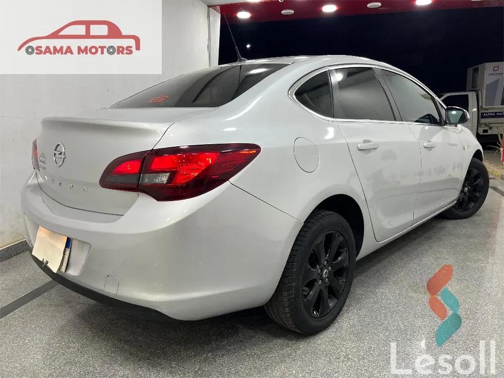 أوبل أسترا اوتوماتك مستعملة فضي موديل 2021 - كل الصور