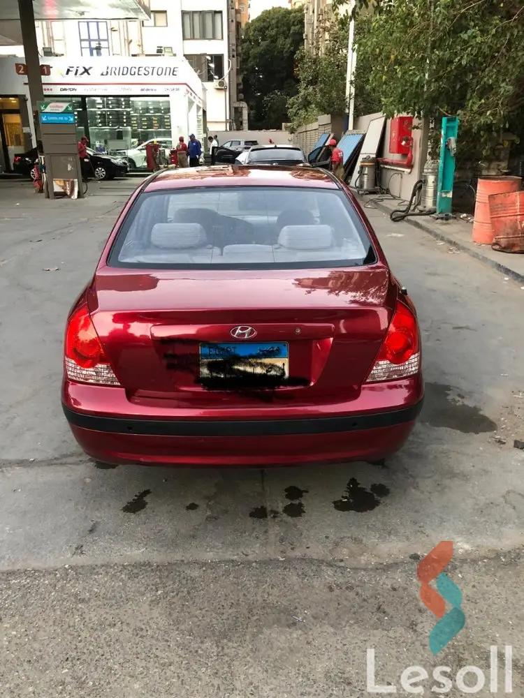 هيونداي إلنترا اوتوماتك مستعملة أحمر موديل 2004