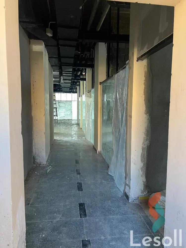 Mall for sale with an area 26 meters in Hadayek October Giza  - All Images