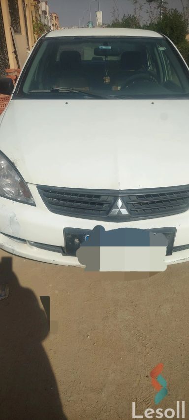 ميتسوبيشي لانسر اوتوماتك مستعملة أبيض موديل 2010
