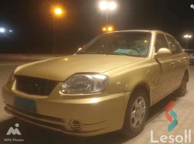 هيونداي فيرنا مانيوال مستعملة ذهبي موديل 2003