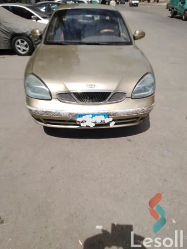 دايو نوبيرا مانيوال مستعملة ذهبي موديل 2000