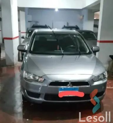 ميتسوبيشي لانسر اوتوماتك مستعملة رمادي داكن موديل 2014