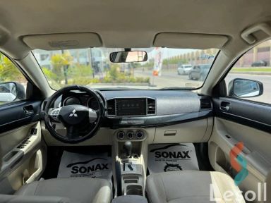 ميتسوبيشي لانسر اوتوماتك مستعملة أبيض موديل 2015