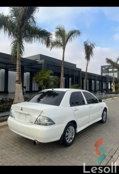 ميتسوبيشي لانسر اوتوماتك مستعملة أبيض موديل 2007