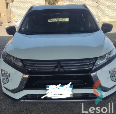 ميتسوبيشي إكليبس كروس اوتوماتك مستعملة أبيض موديل 2021