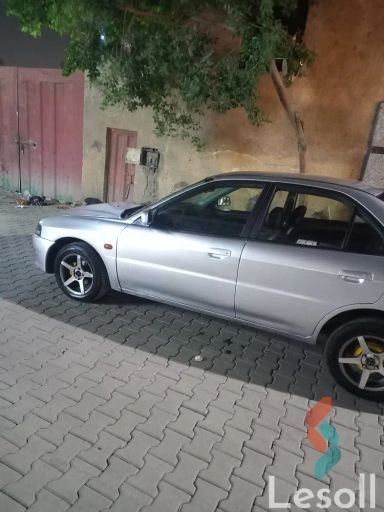 ميتسوبيشي لانسر اوتوماتك مستعملة فضي موديل 1998