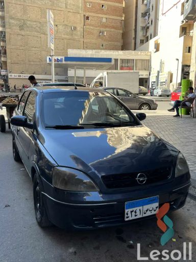 أوبل كورسا مانيوال مستعملة كحلي موديل 2004