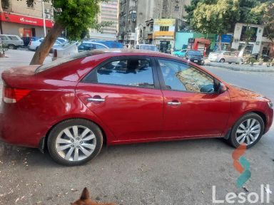 كيا سيراتو اوتوماتك جديدة أحمر موديل 2010