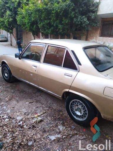 بيجو 405 مانيوال مستعملة ذهبي موديل 1987