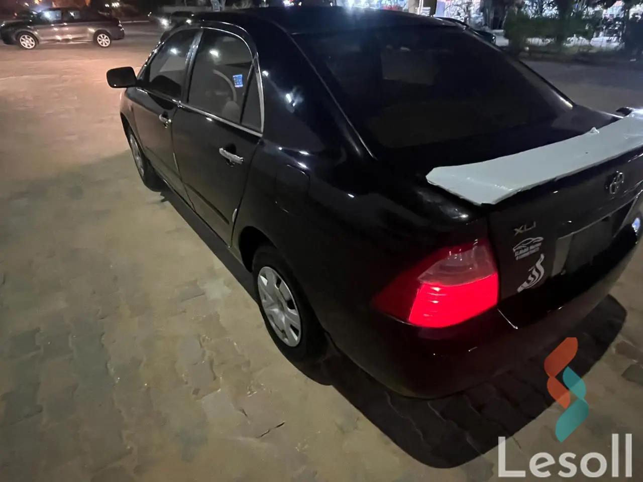 تويوتا كورولا اوتوماتك مستعملة أسود موديل 2005 - صورة 3