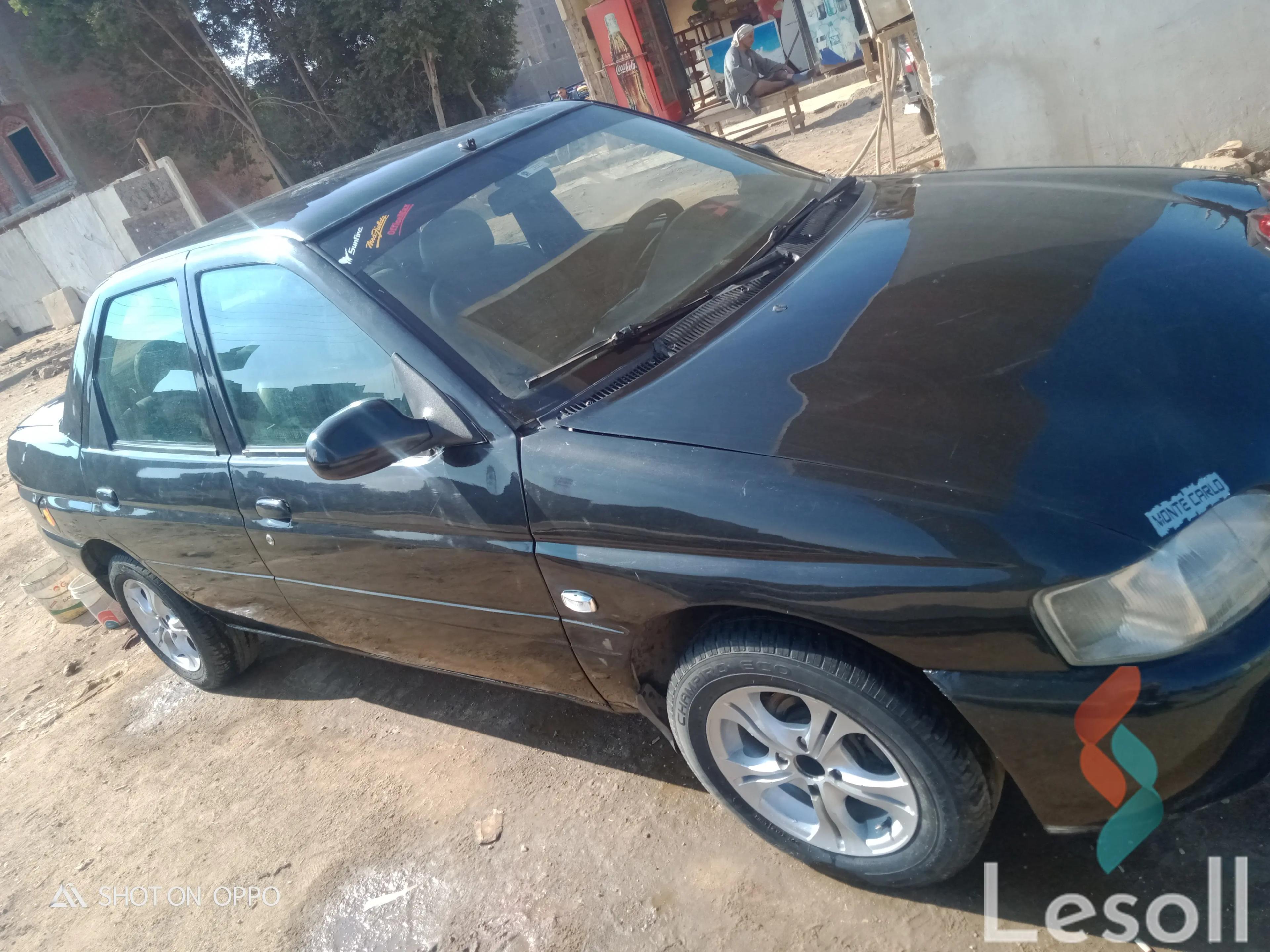 Ford escape manual used black model 1999 - Main Image