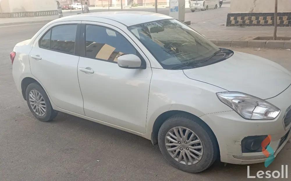 سوزوكي ديزاير مانيوال مستعملة أبيض موديل 2021 - صورة 4