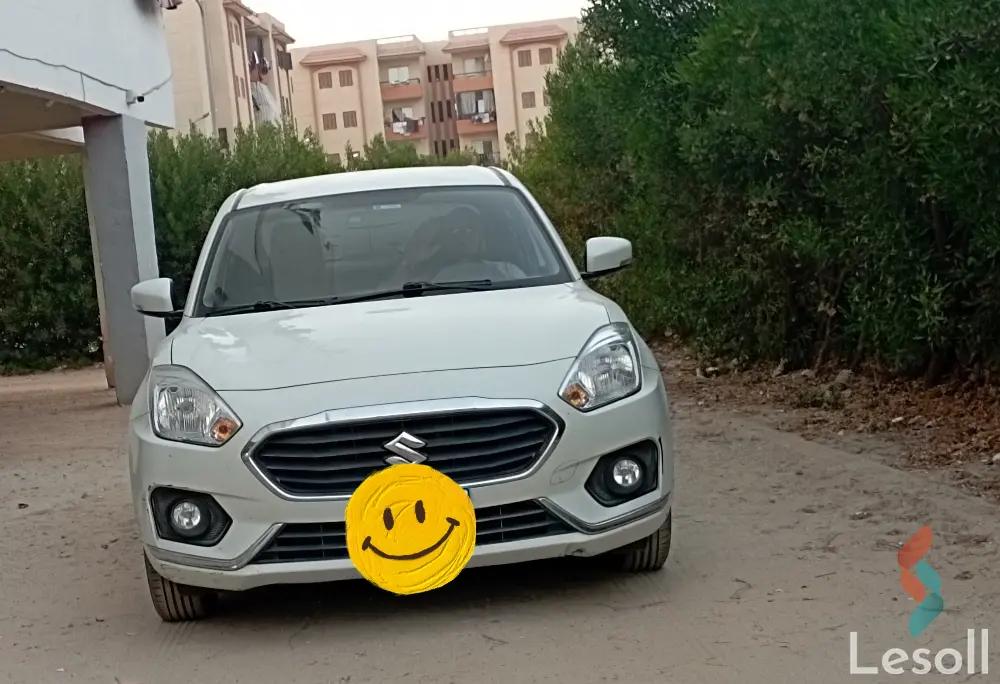 سوزوكي ديزاير مانيوال مستعملة أبيض موديل 2021 - صورة 2